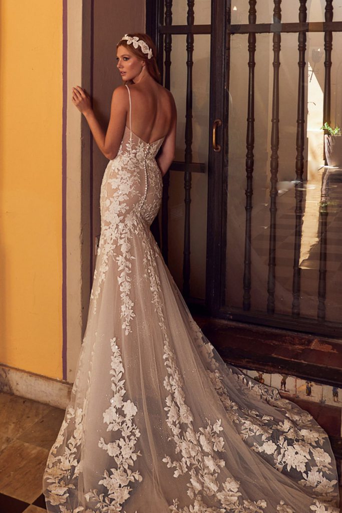 Among the myriad of styles available, the mermaid style wedding dress stands out as a timeless and elegant option.
